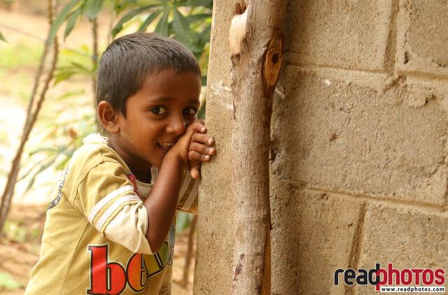 Young Boy playing, Welikanda, Sri Lanka - Read Photos