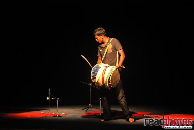 Man playing a traditional drum, Sri Lanka