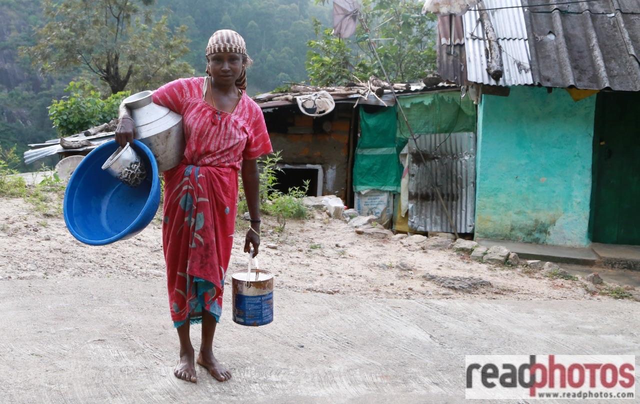 Woman bringing water