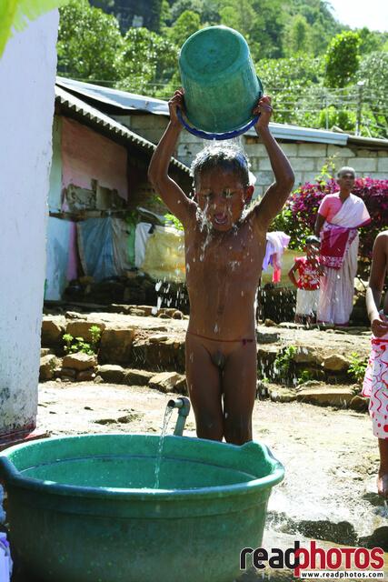 Bathing boy, Sri Lanka - Read Photos