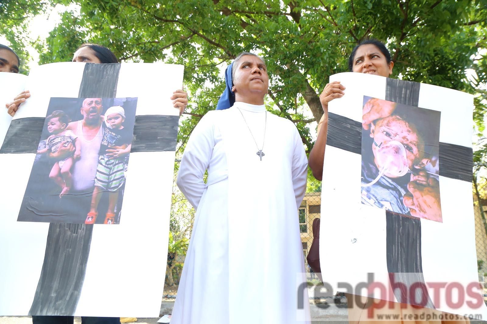 Silent protest by The Kithusara Group against the crucifixion of Palestinians