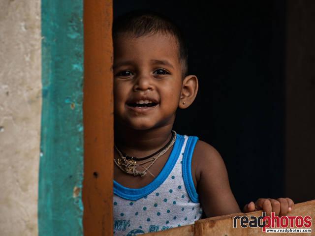Child looking at - Read Photos